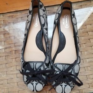 Coach flats.